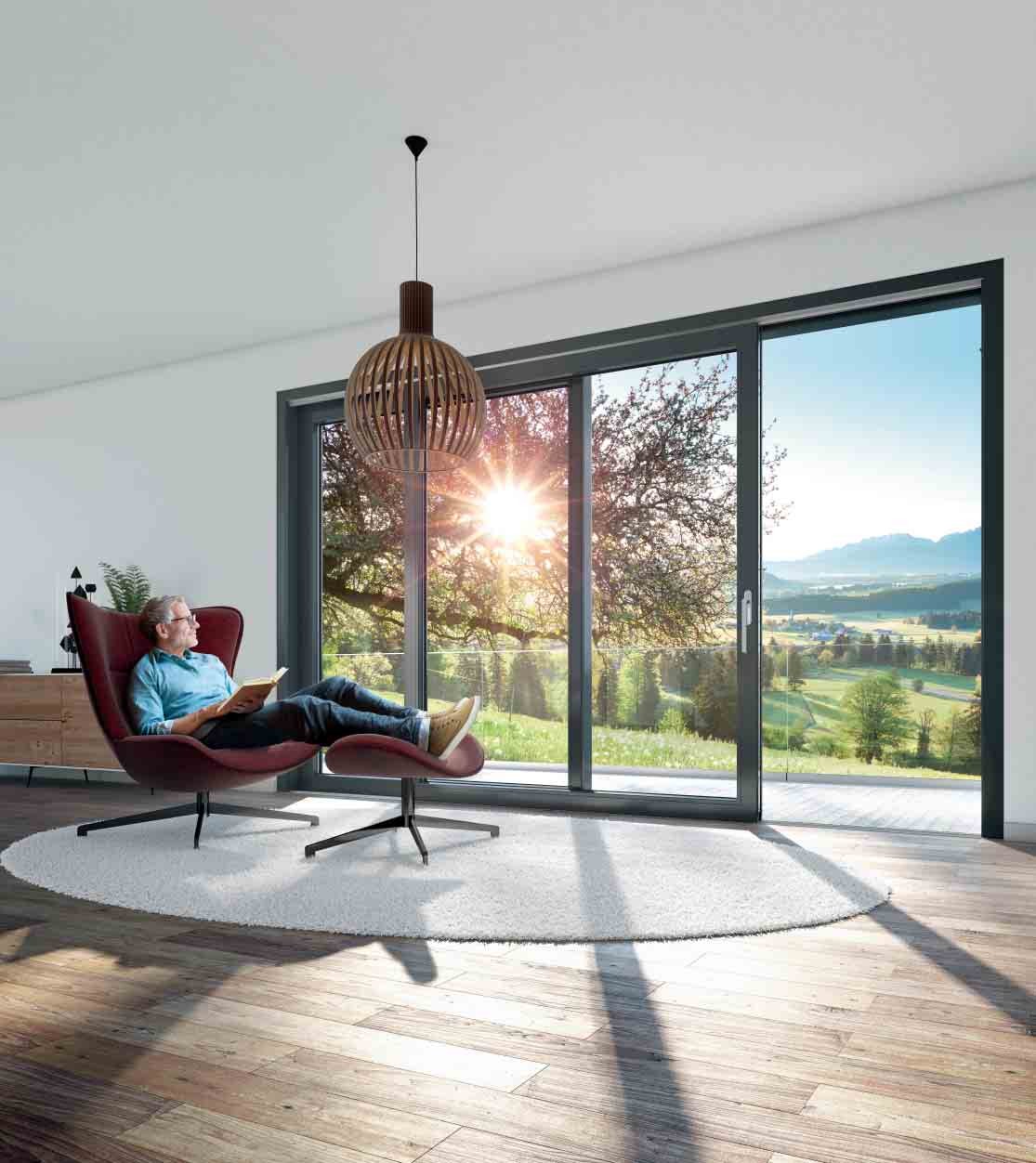 Grande baie PVC Schüco LivIngSlide ouverte sur le jardin